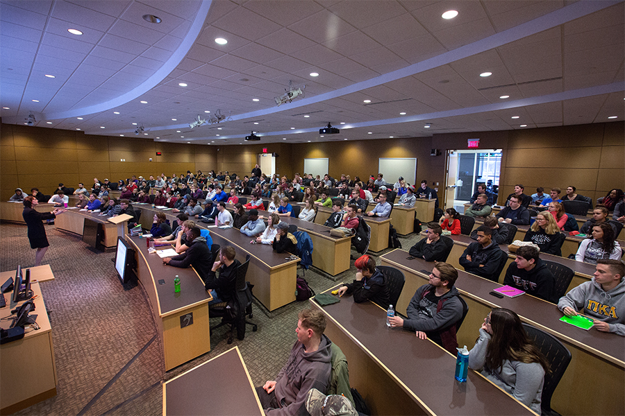 Communication majors holding class in Timmerman Auditorium