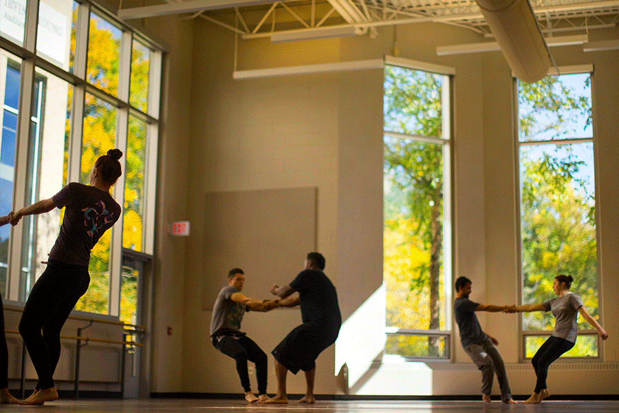 Learning the art of partner work in the dance studio on the University of Wisconsin Whitewater campus.