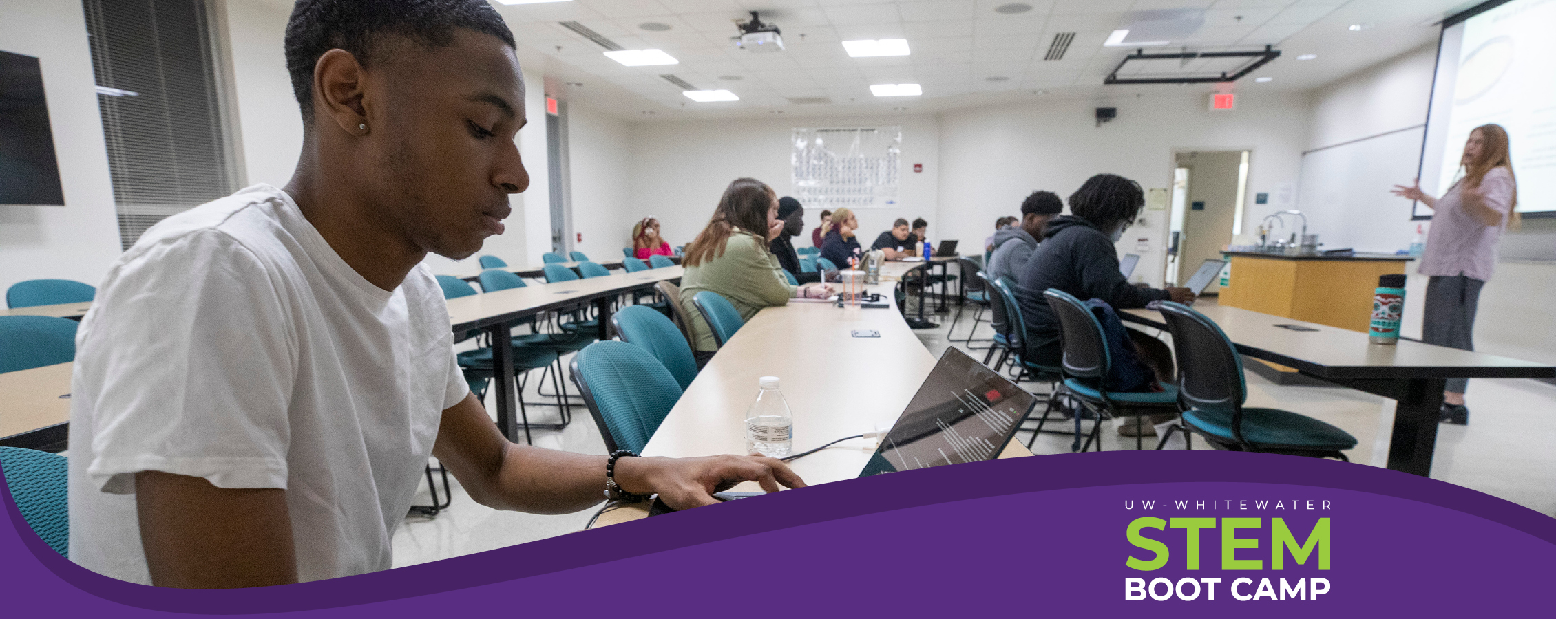 A student works on a computer during class.