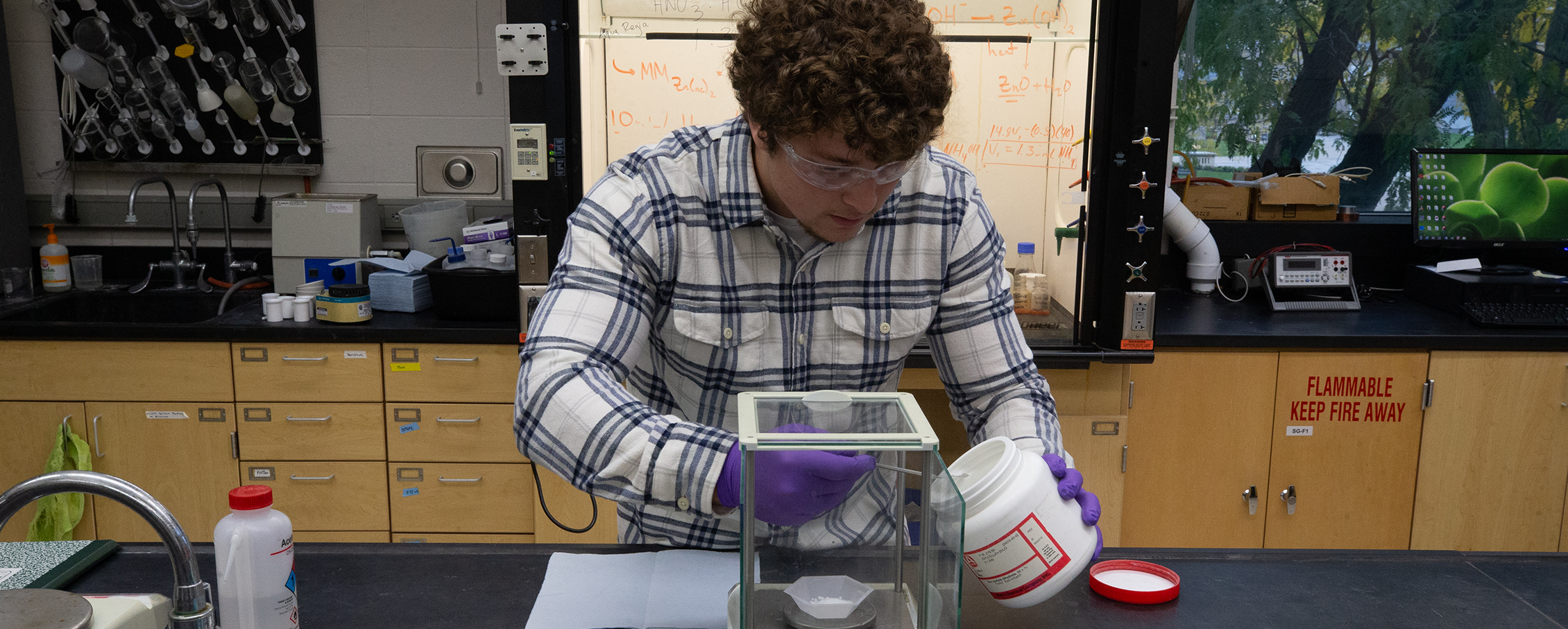 A student works in the chemistry lab.