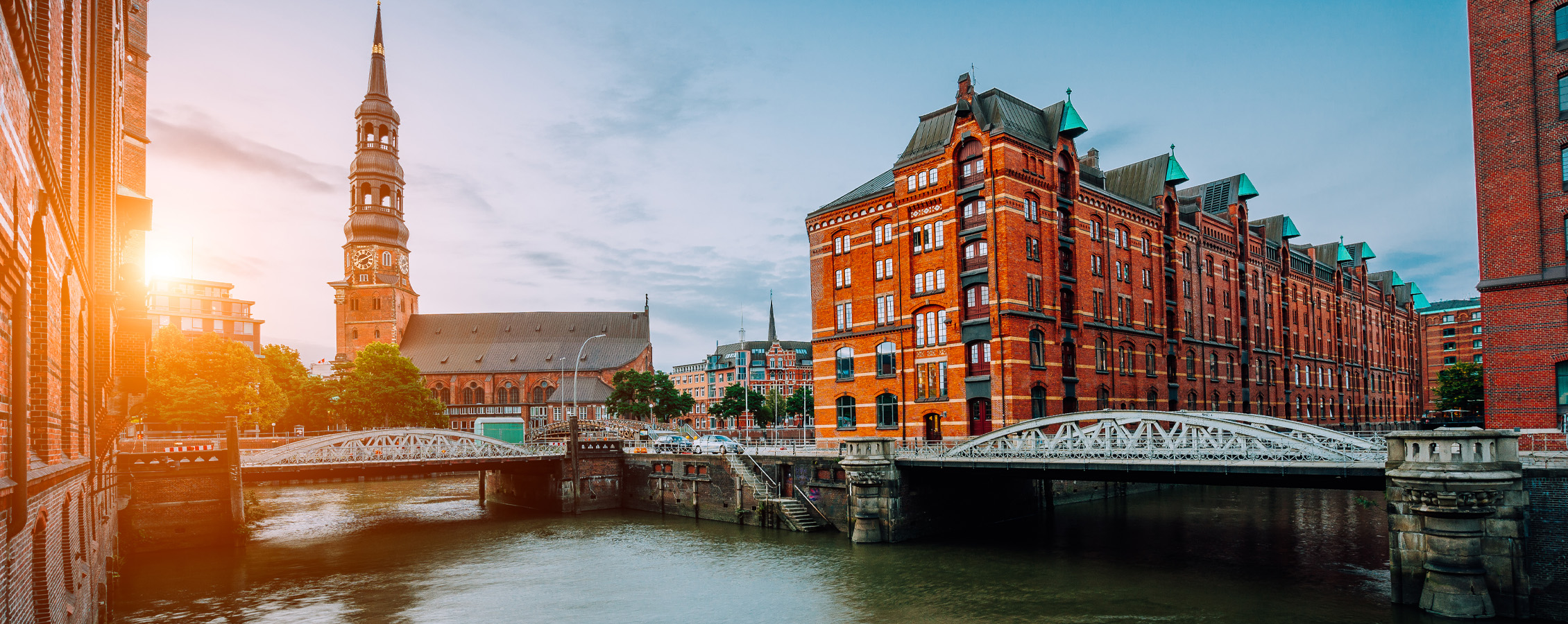 View of a German city with sun rising over the horizon