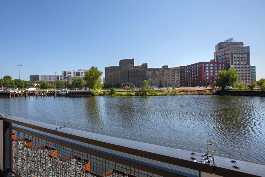 A river runs through an industrial area.