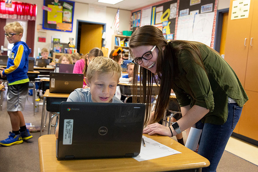 Early Childhood Education student teaches child