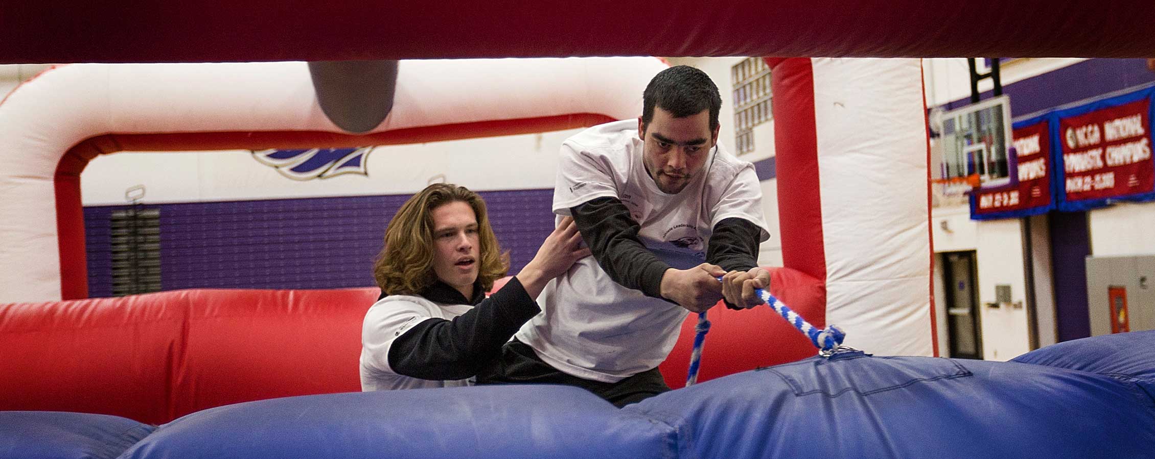 Students on a jump house