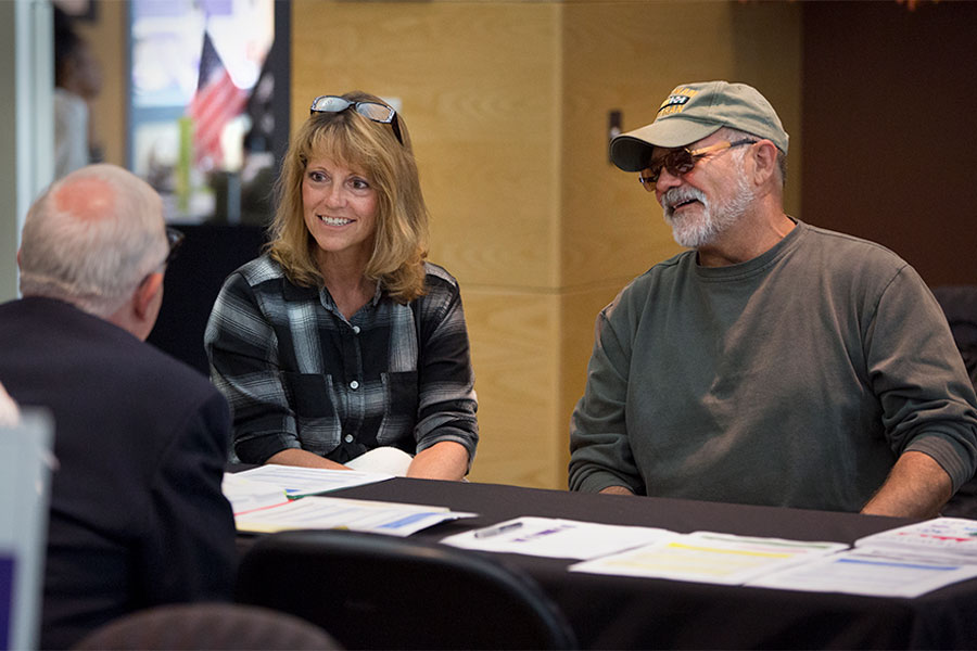  A discussion at a Veteran & Family Members Education Fair in the Old Main Ballroom of the University Center.