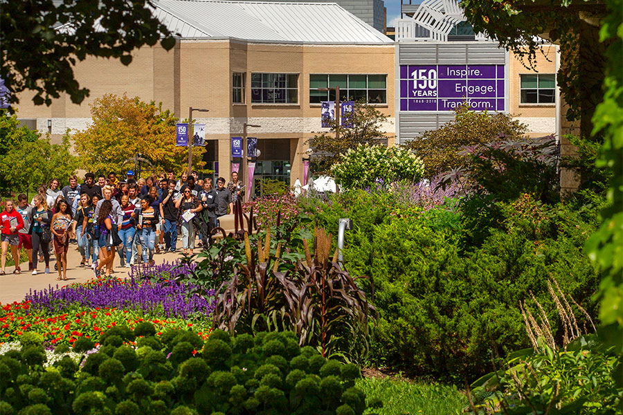 A Hawk Squad member leads a campus tour.