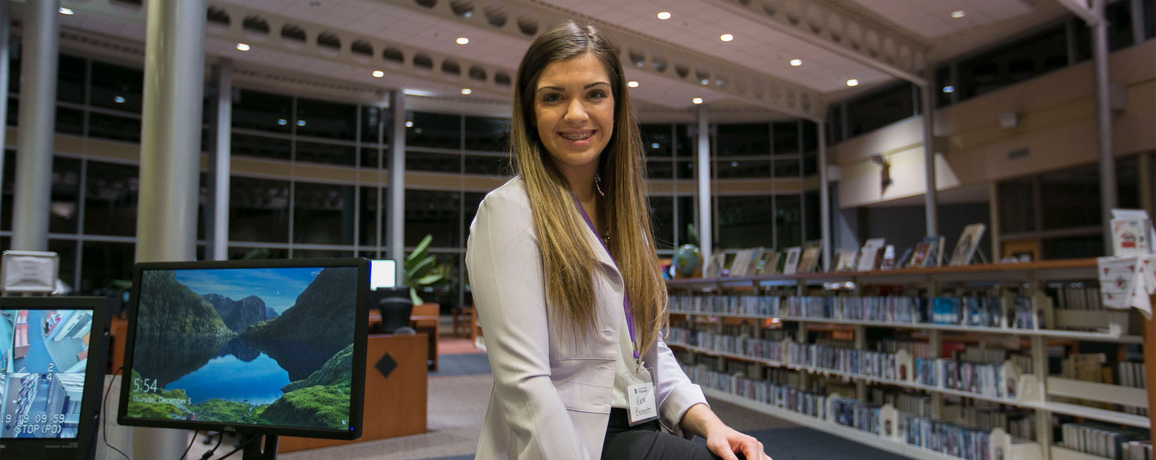 A student sits in the UW-Rock County library.