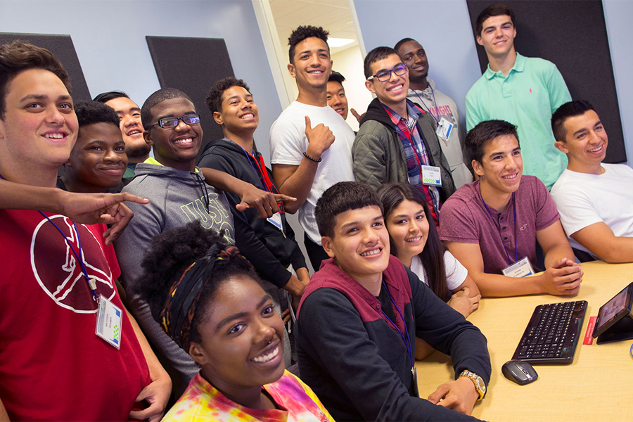 A large group pf students pose together for a photo.