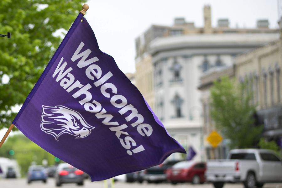 A small flag that says Welcome Warhawks