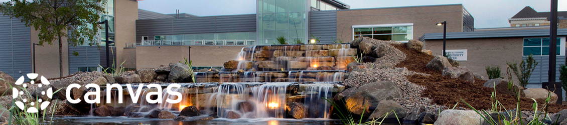 Waterfall on campus in front of building