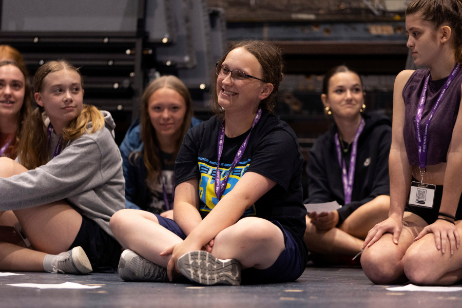 Student performing on stage