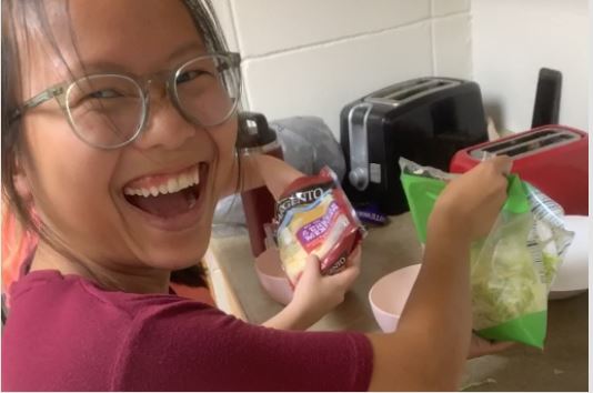 LIFE student showing off cooking skills