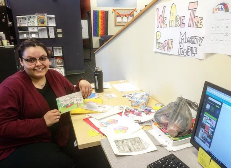 Pride Center Intern working in the office