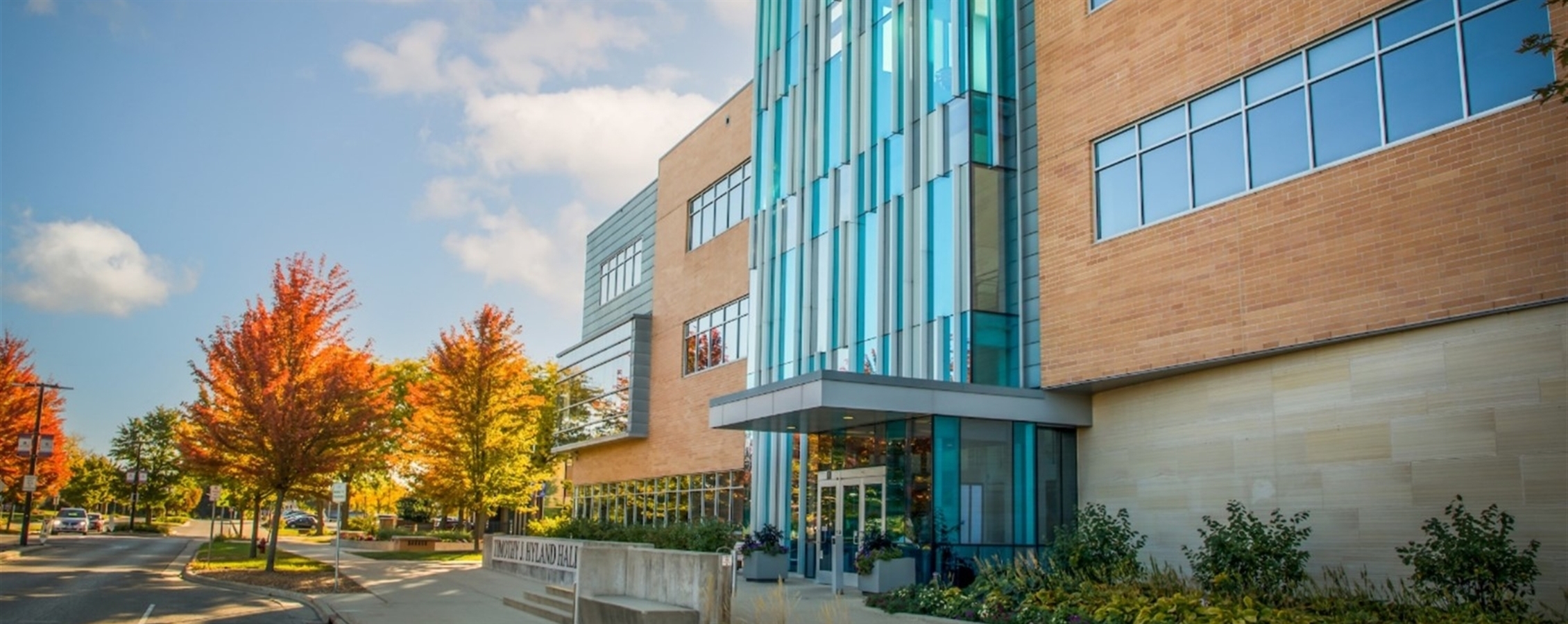 Picture of Hyland Hall with Fall Background