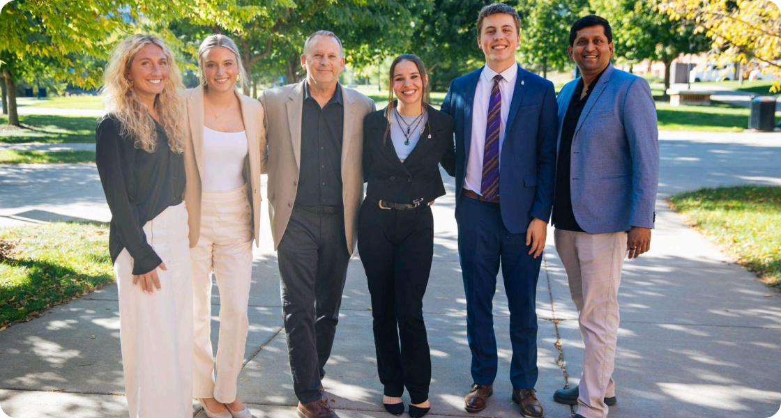 Team picture with uww whitewater student and faculty
