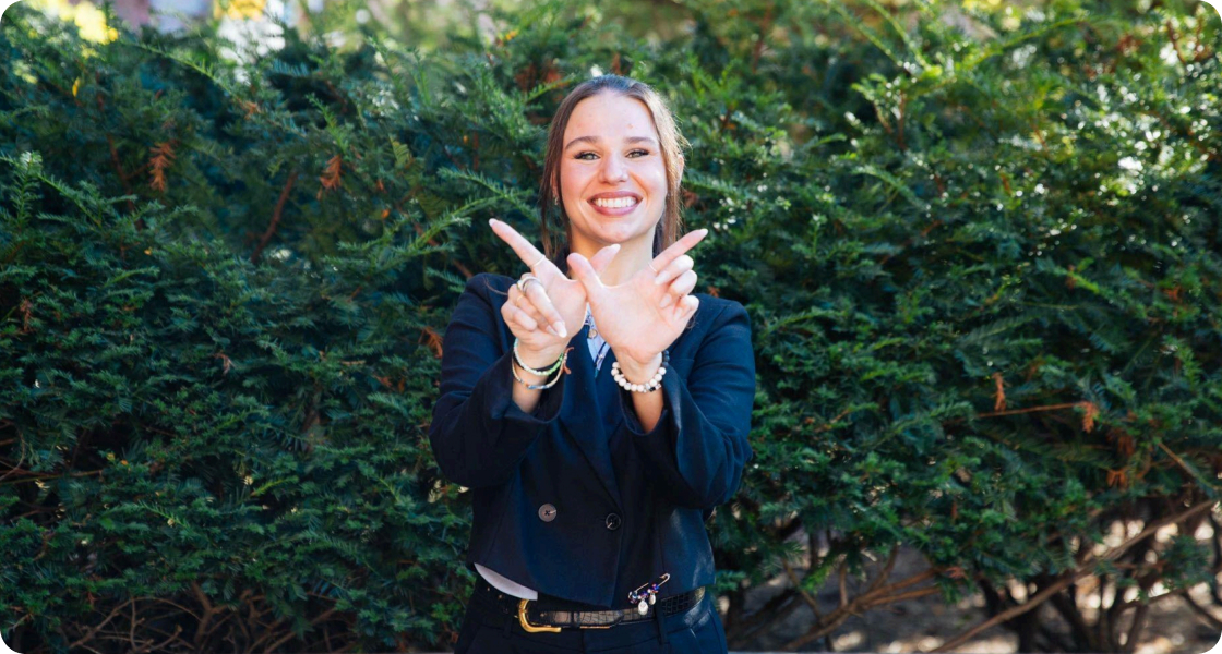 Student with victory pose