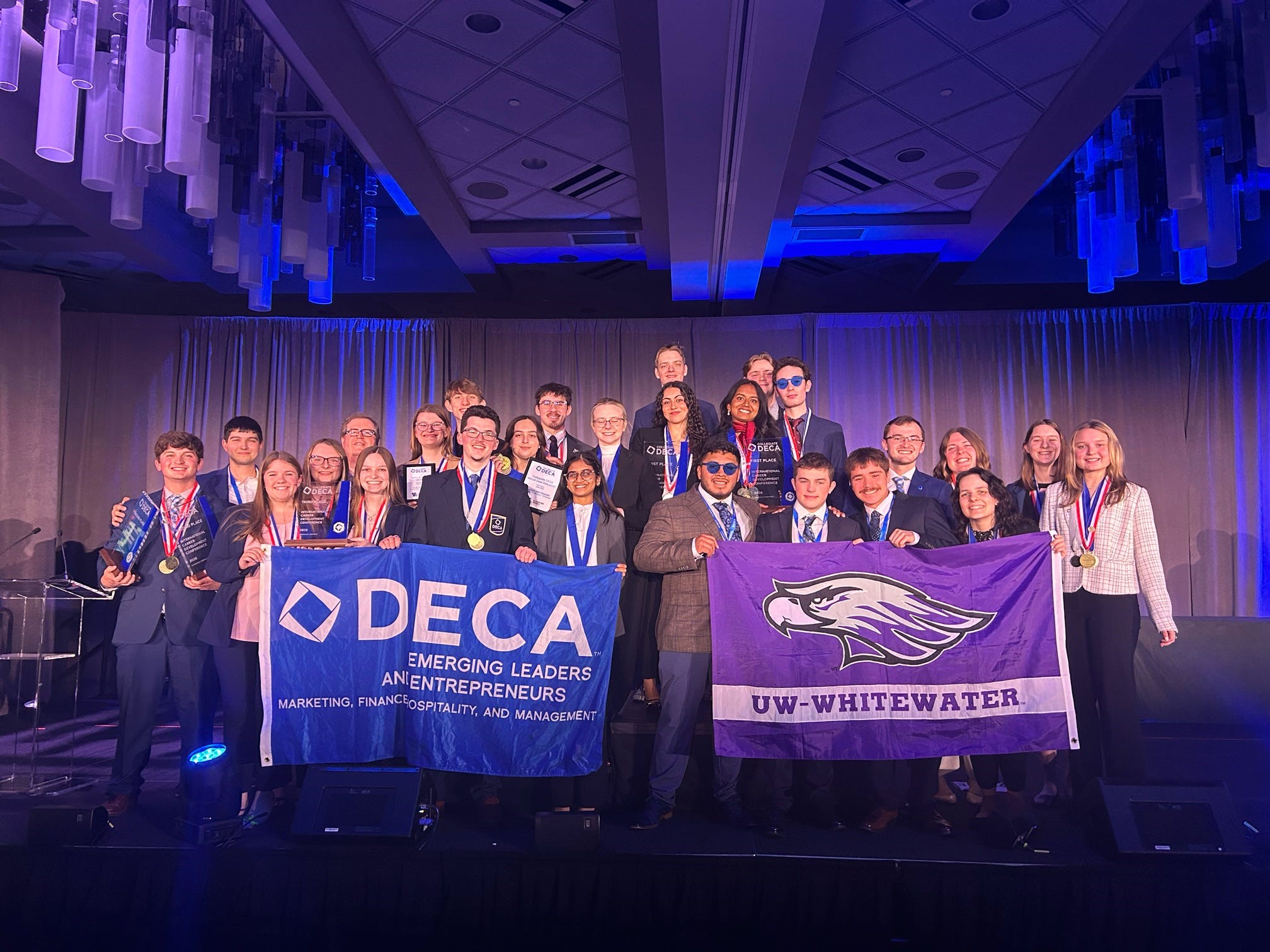 The UW-Whitewater DECA Chapter smiles with their trophies at the 2026 International Career Development Conference in Louisville, KY.