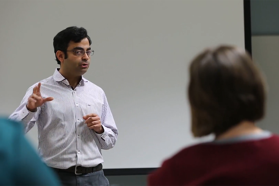 Associate Professor of Management Aditya Simha instructs a University of Wisconsin-Whitewater MBA class. (UW-Whitewater photo/Jonathon Kelley)