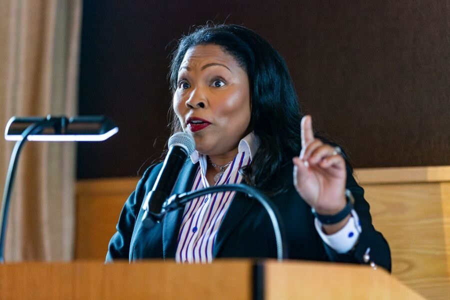 Dr. Camelia Clark, DBA alumnae, gives her speech at the reunion, reflecting on the program.