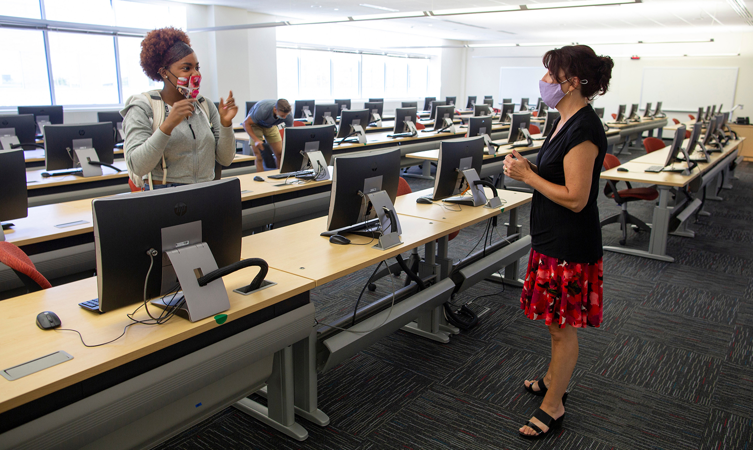 A human resources management major consults with Lecturer Linda Amann after an Information Systems 280 class in Hyland Hall on Sept. 2, 2020..