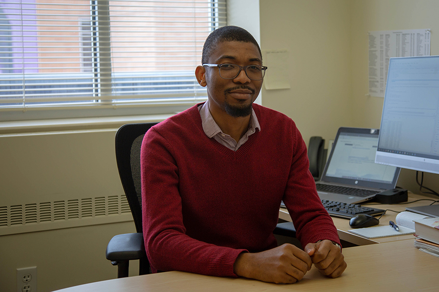 Professor Matthew Winden works with a student