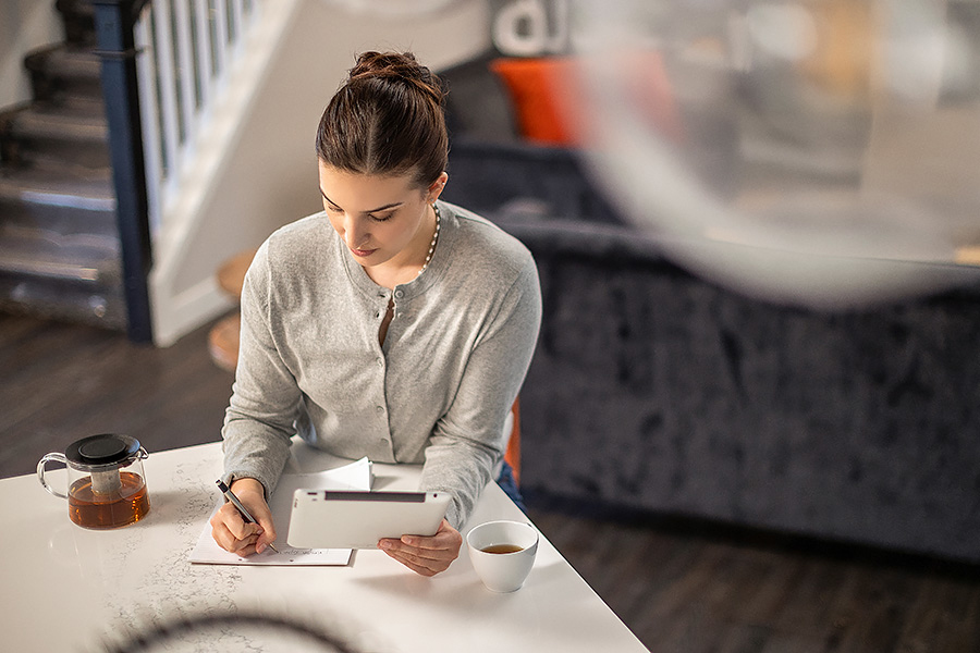 Student taking an at home exam from her phone