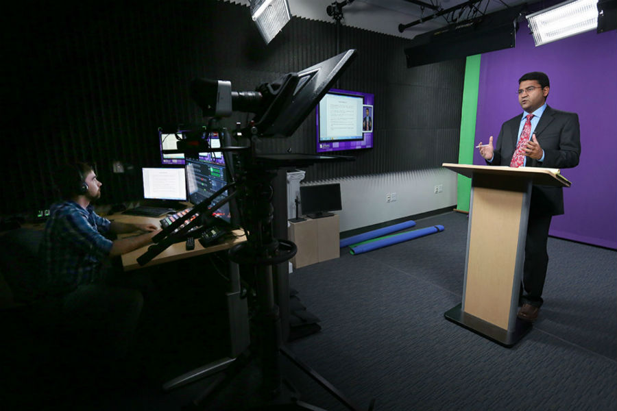 Assistant Professor Balaji Sankaranarayanan, right, records a segment for his graduate-level course. (UW-Whitewater photo/Craig Schreiner)