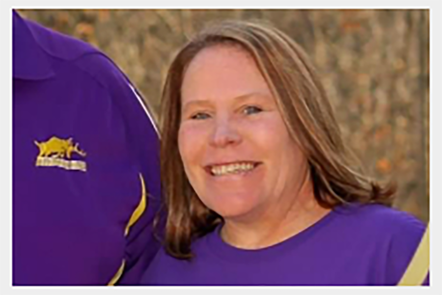 Bridget Vaughn smiles while wearing a purple sweatshirt.