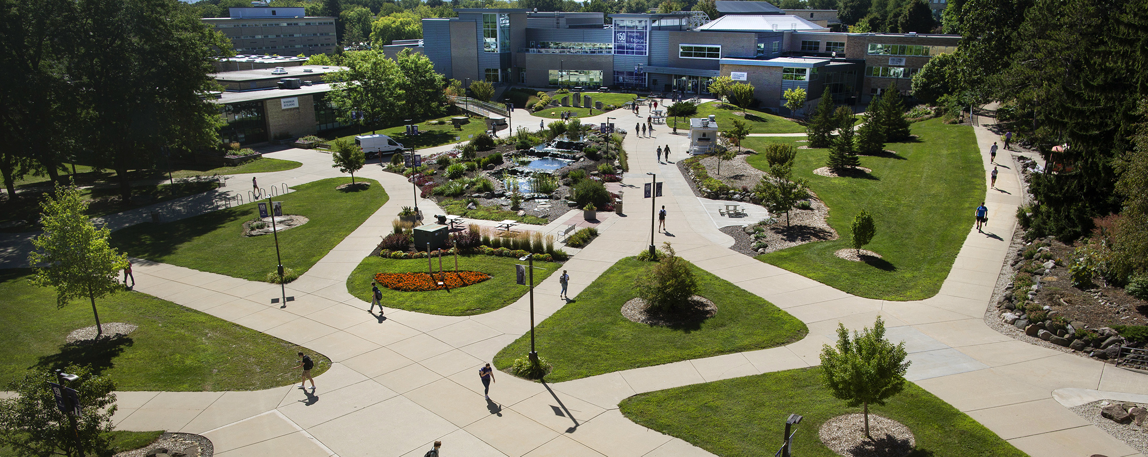 Overhead view of the center of the UW-Whitewater campus with students walking through the campus.