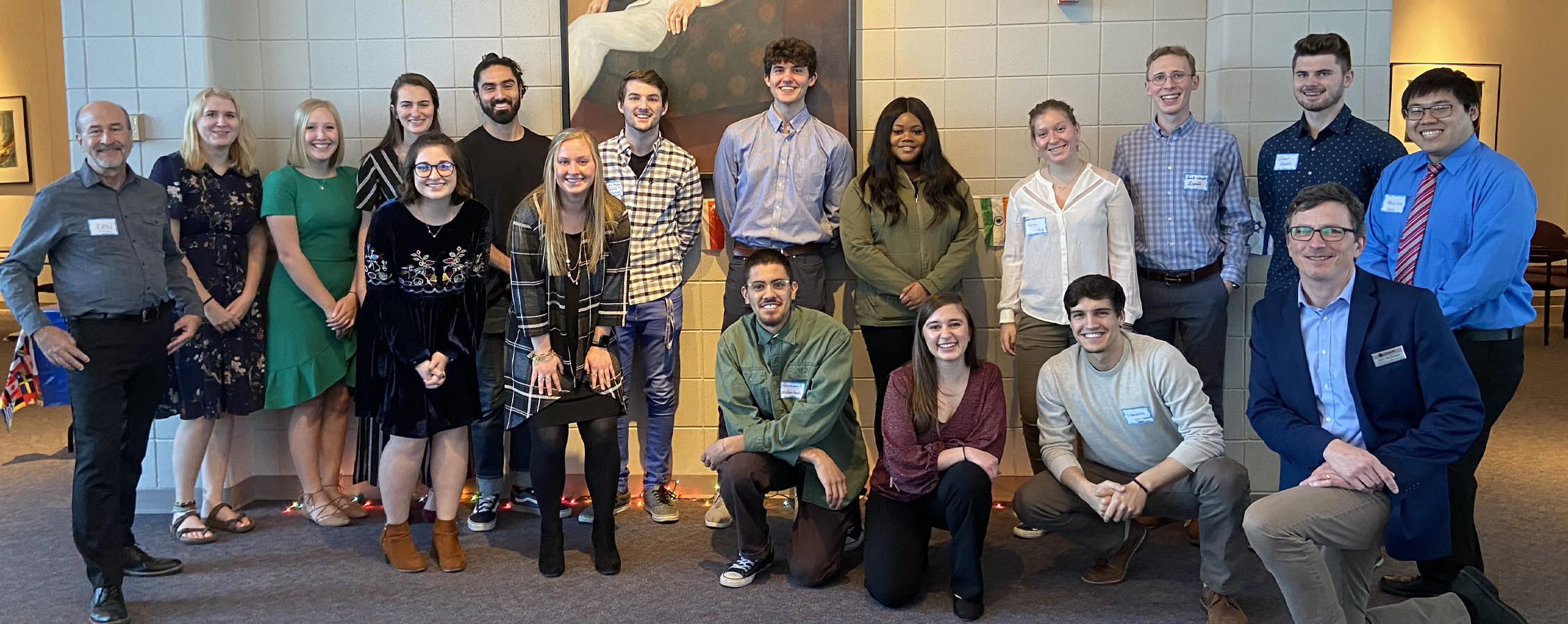 Students and faculty pose for a group photo.