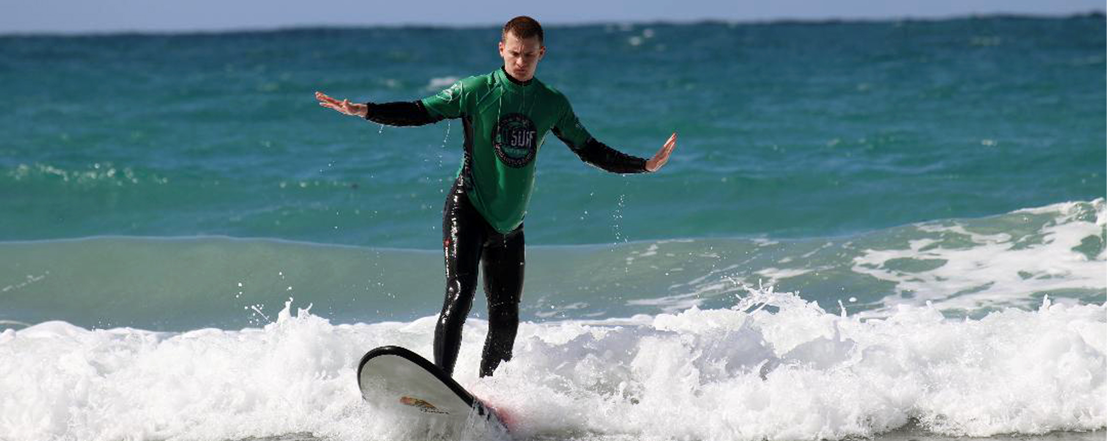 A person surfing in the ocean.