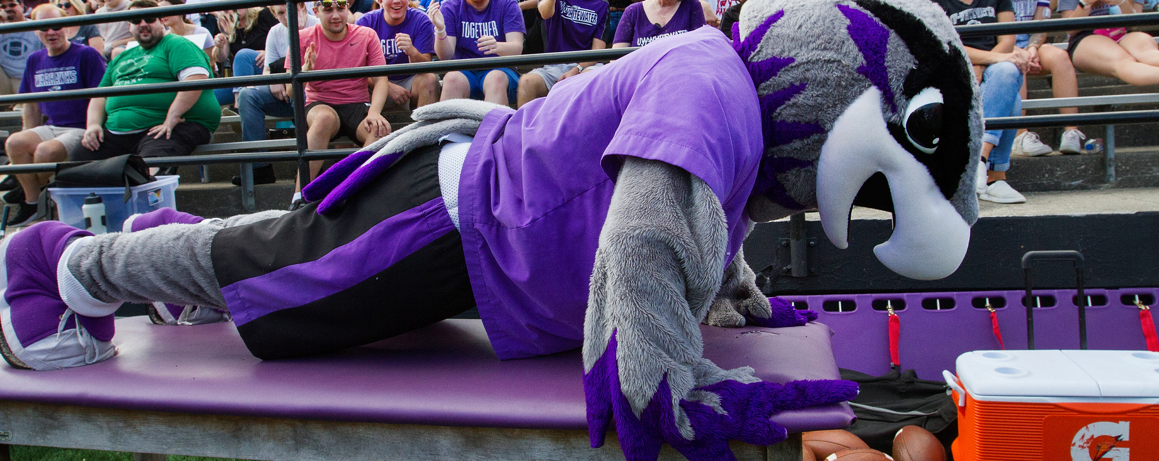 Willie Warhawk wearing a Warhawks jersey spreads his wings.