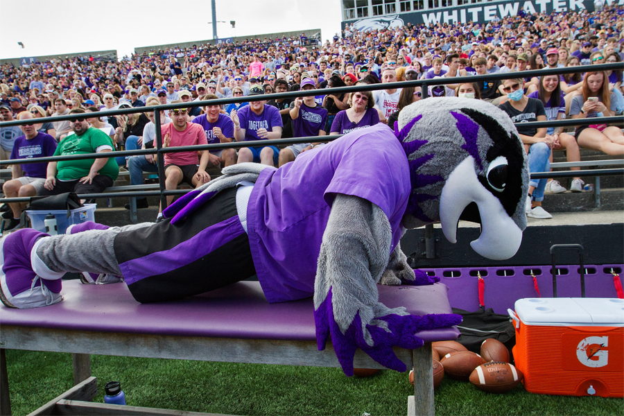 Willie Warhawk in a Warhawks jersey spreads his wings.