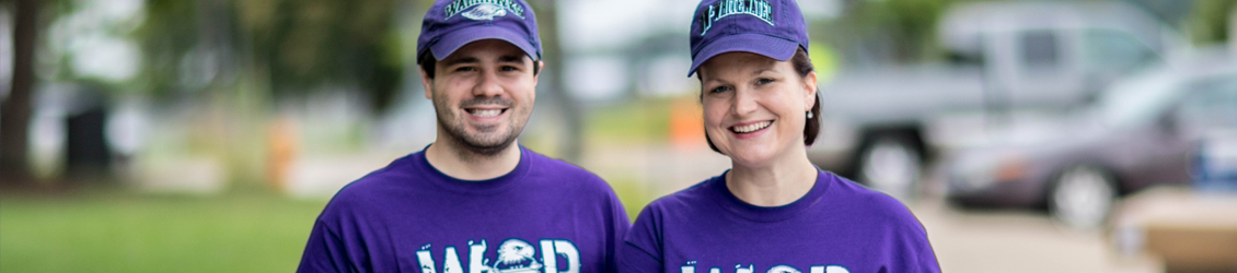 Mother and her son dressed in UWW apparel