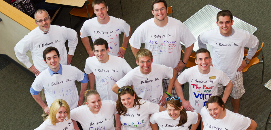 Group of people posing for a picture