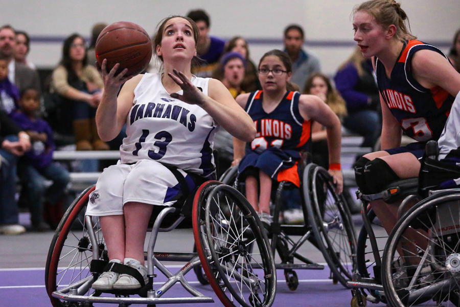 Becca Murray shoots a basket.