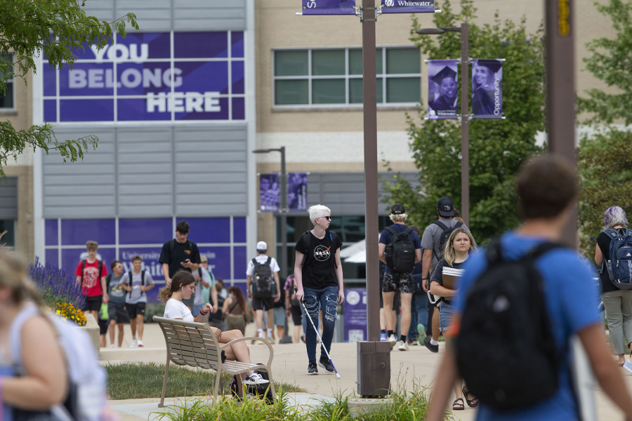 Students walk outside the University Center on the first day of class.