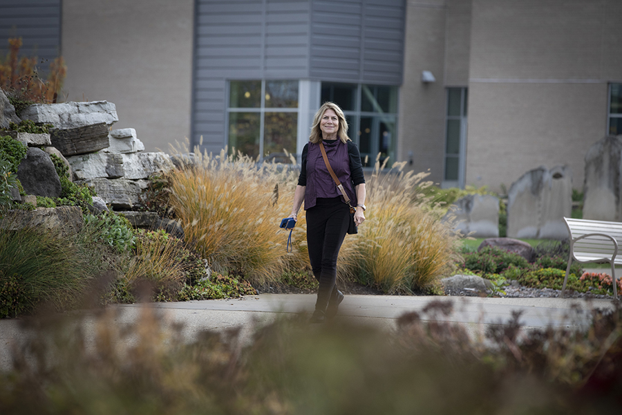 Barbara Kreisman walks outside.