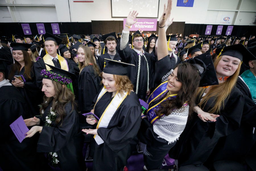 students sitting at graduation ceremony