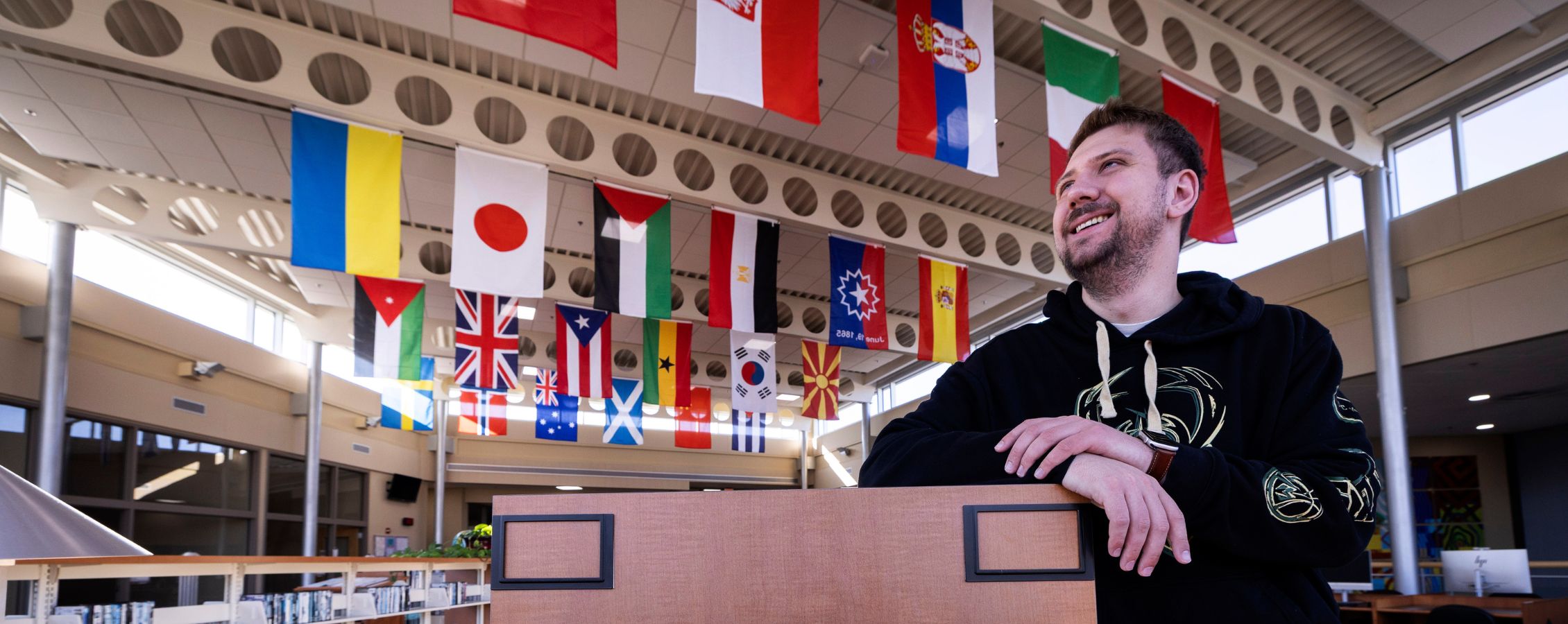 Photo of Cade looking ahead at a library.