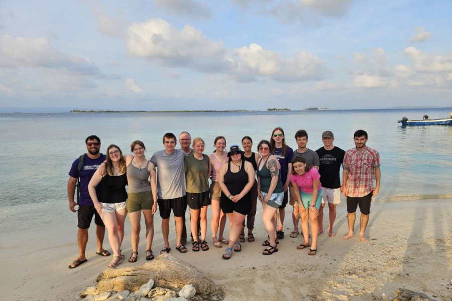 Photo of people gathered at a lake.