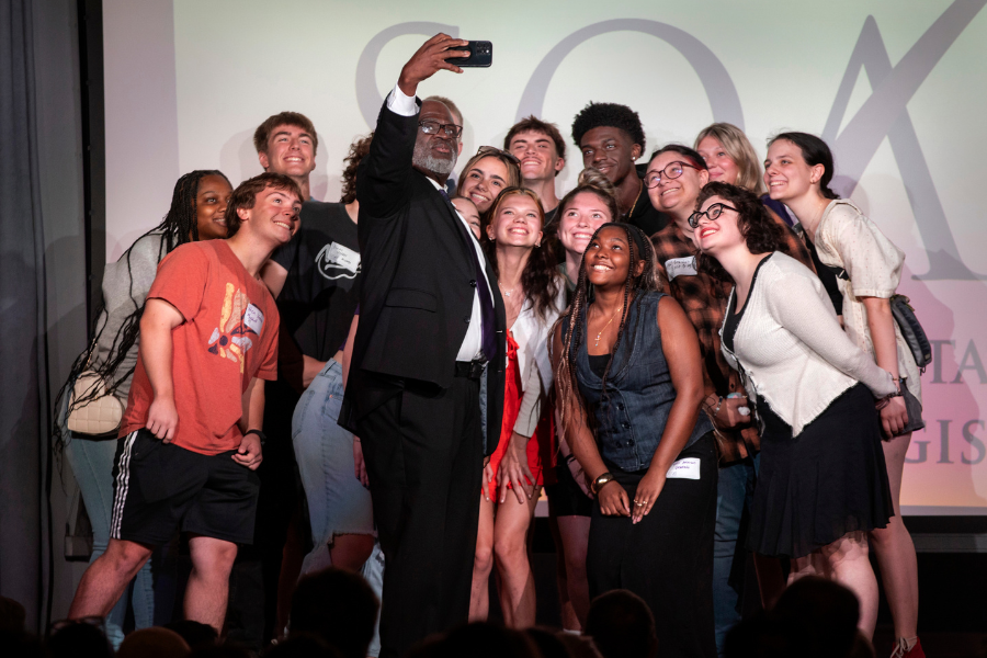 Chancellor Corey A. King continues his tradition of taking a selfie onstage in the Hamilton Room of the University Center with some of the new students at the SOAR program. New students with their family members and friends visited campus on Tuesday, June 11, 2025.