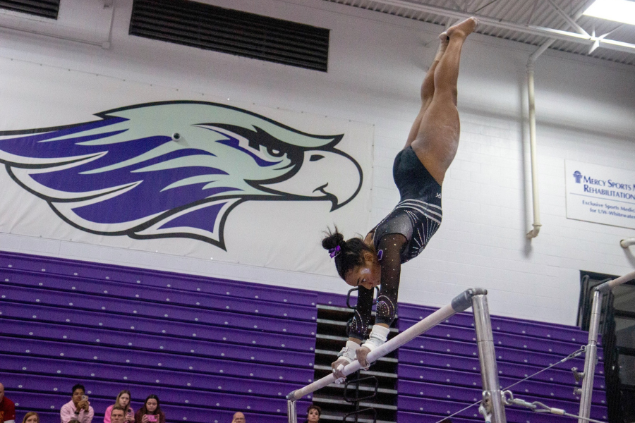 Student does Gymnastic tricks.