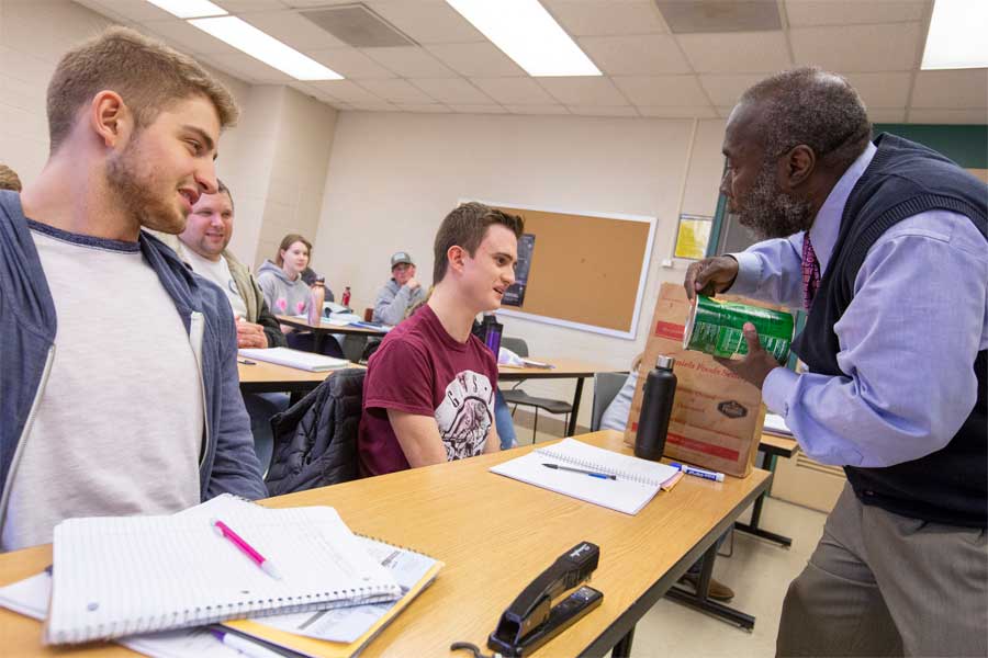 Students in class with a faculty member.