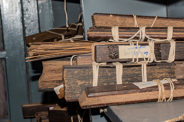 Piles of manuscripts tied together with string