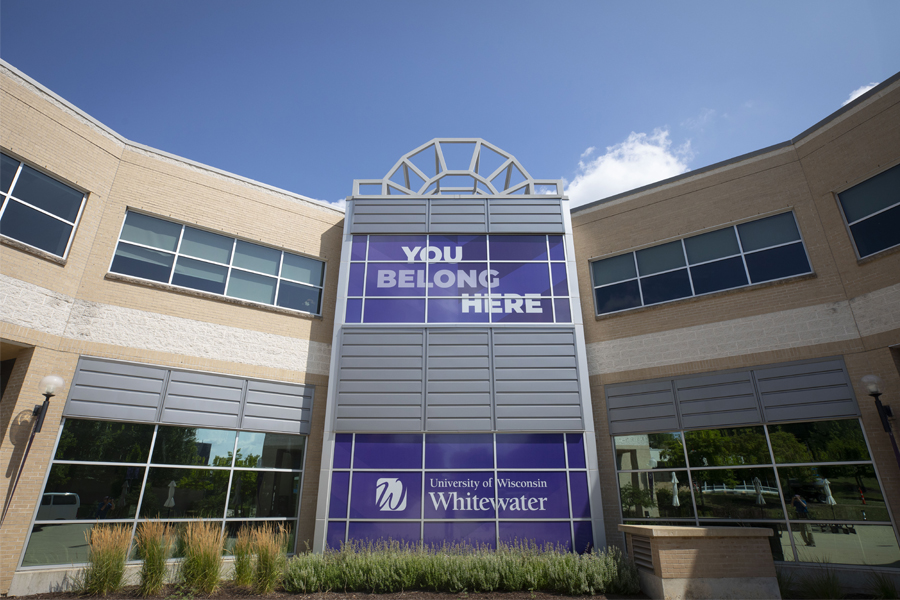 Building with UW-Whitewater signs in the windows.