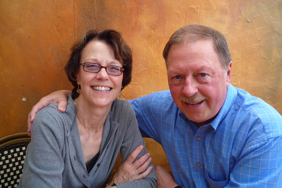 Two people pose for a photo.